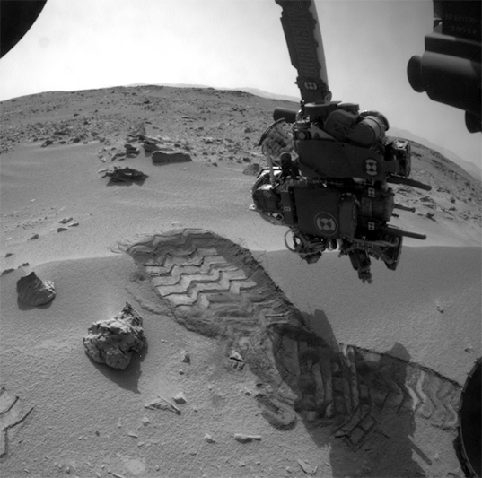 Curiosity applying the arm at Rocknest, sol 58