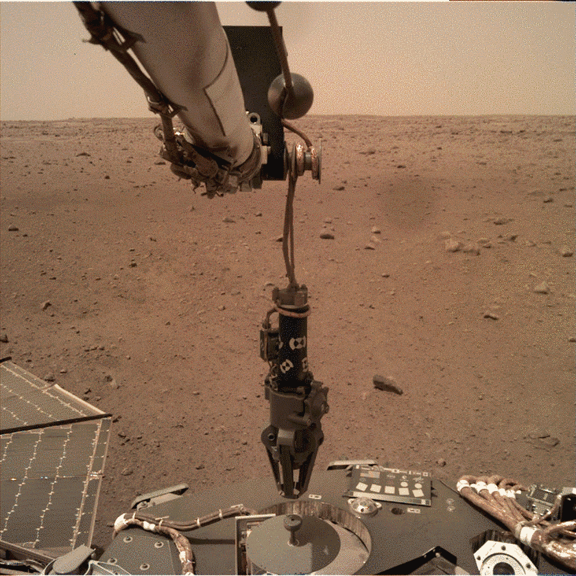 InSight places the heat probe instrument on the ground, sol 76 (IDC)