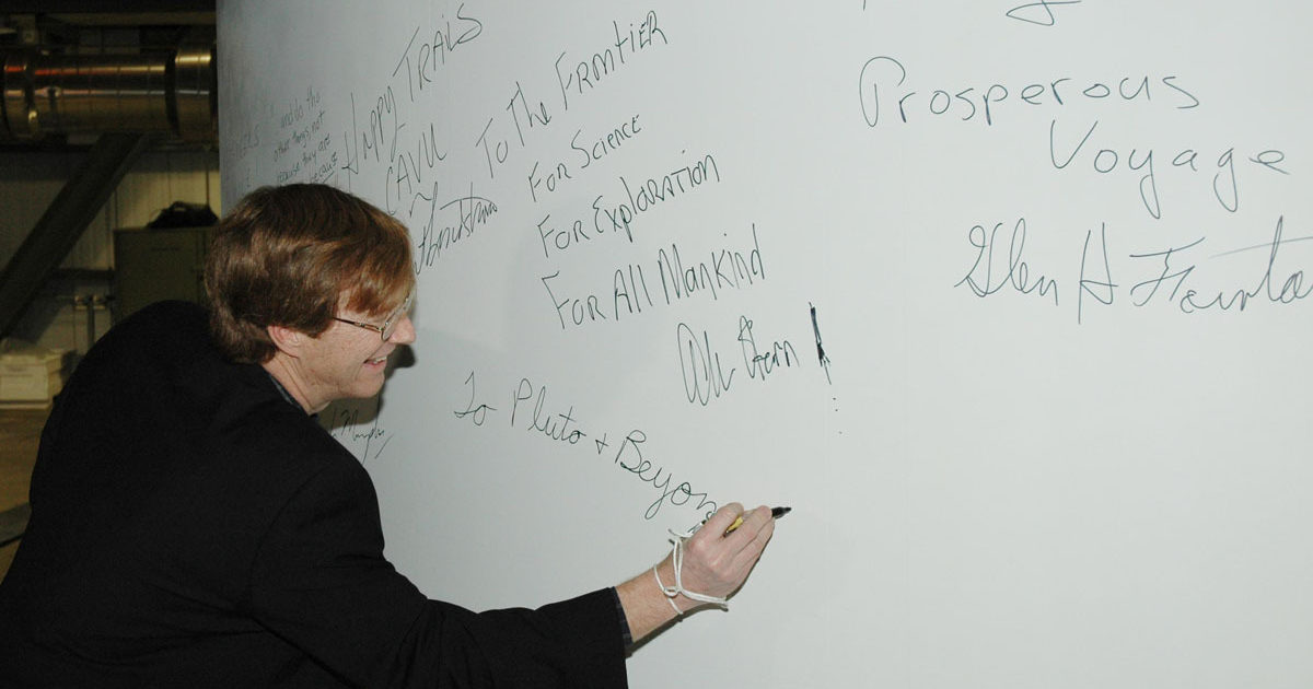 Hal Weaver signs the fairing on the New… | The Planetary Society