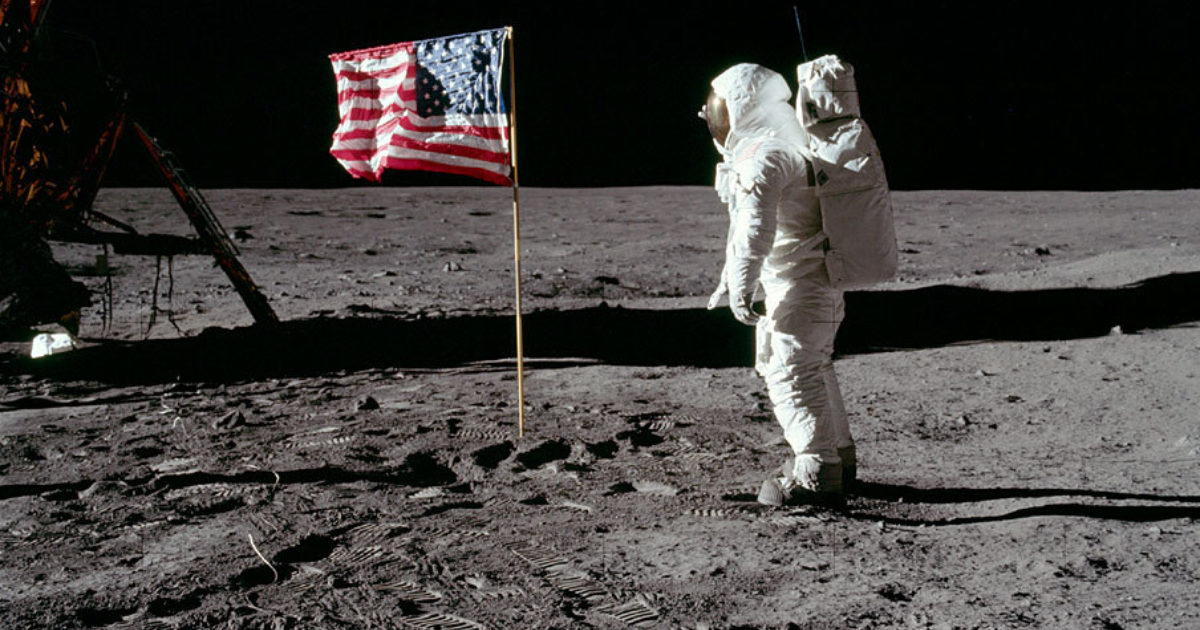 astronaut saluting flag