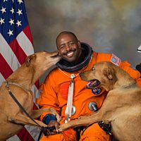 Leland melvin with dogs