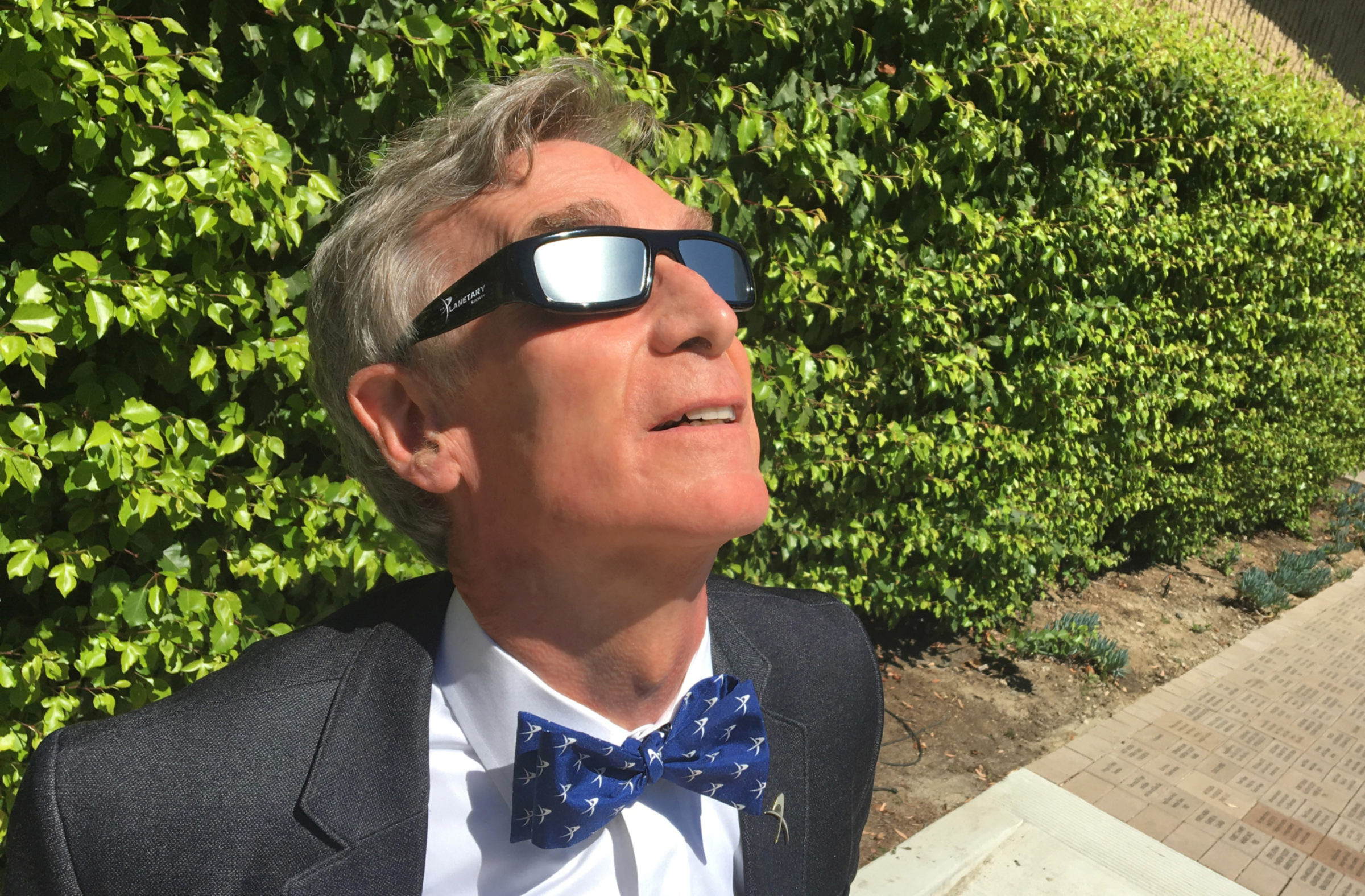 Bill Nye with eclipse glasses The Society