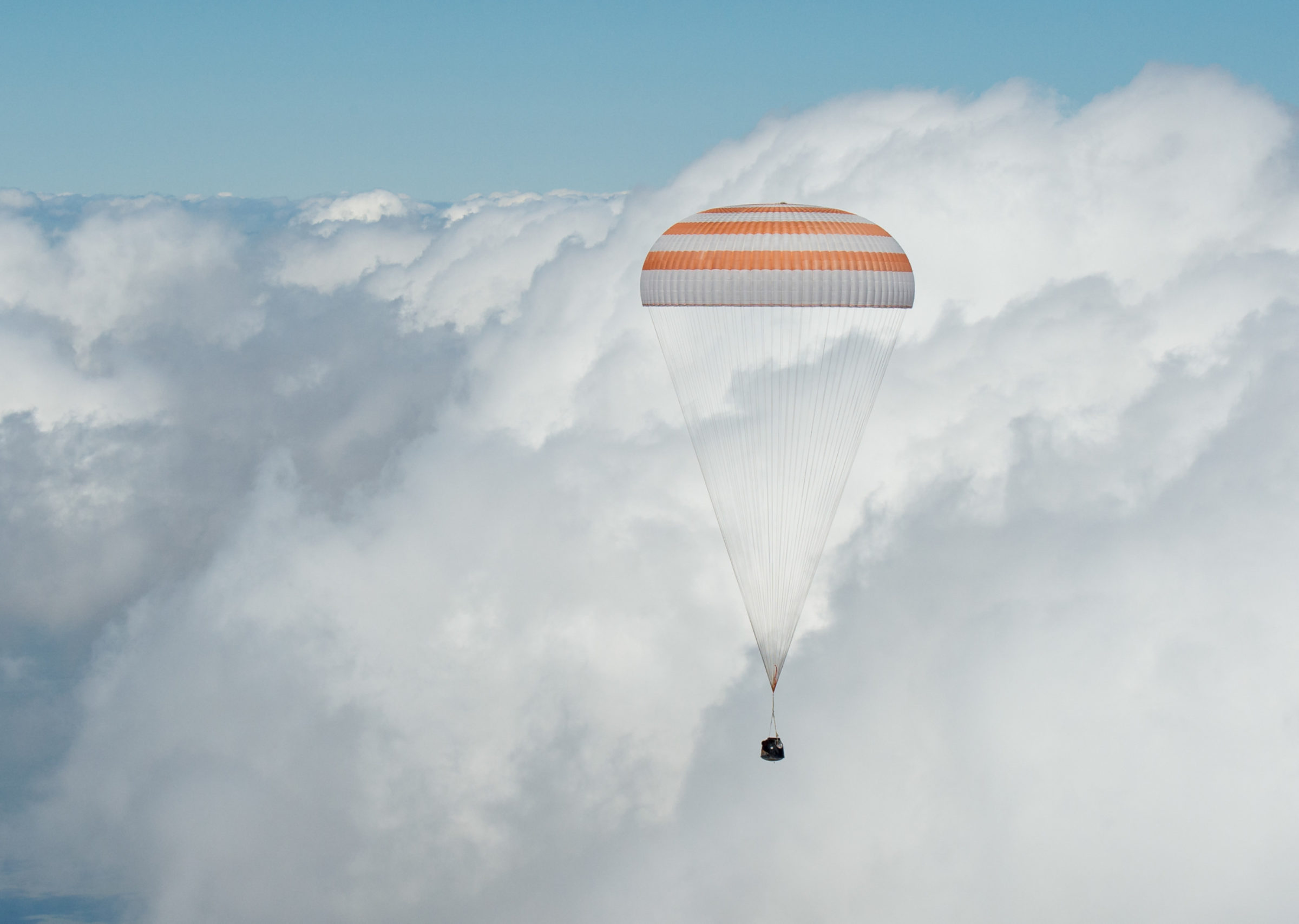 Soyuz TMA19M capsule descends The Society