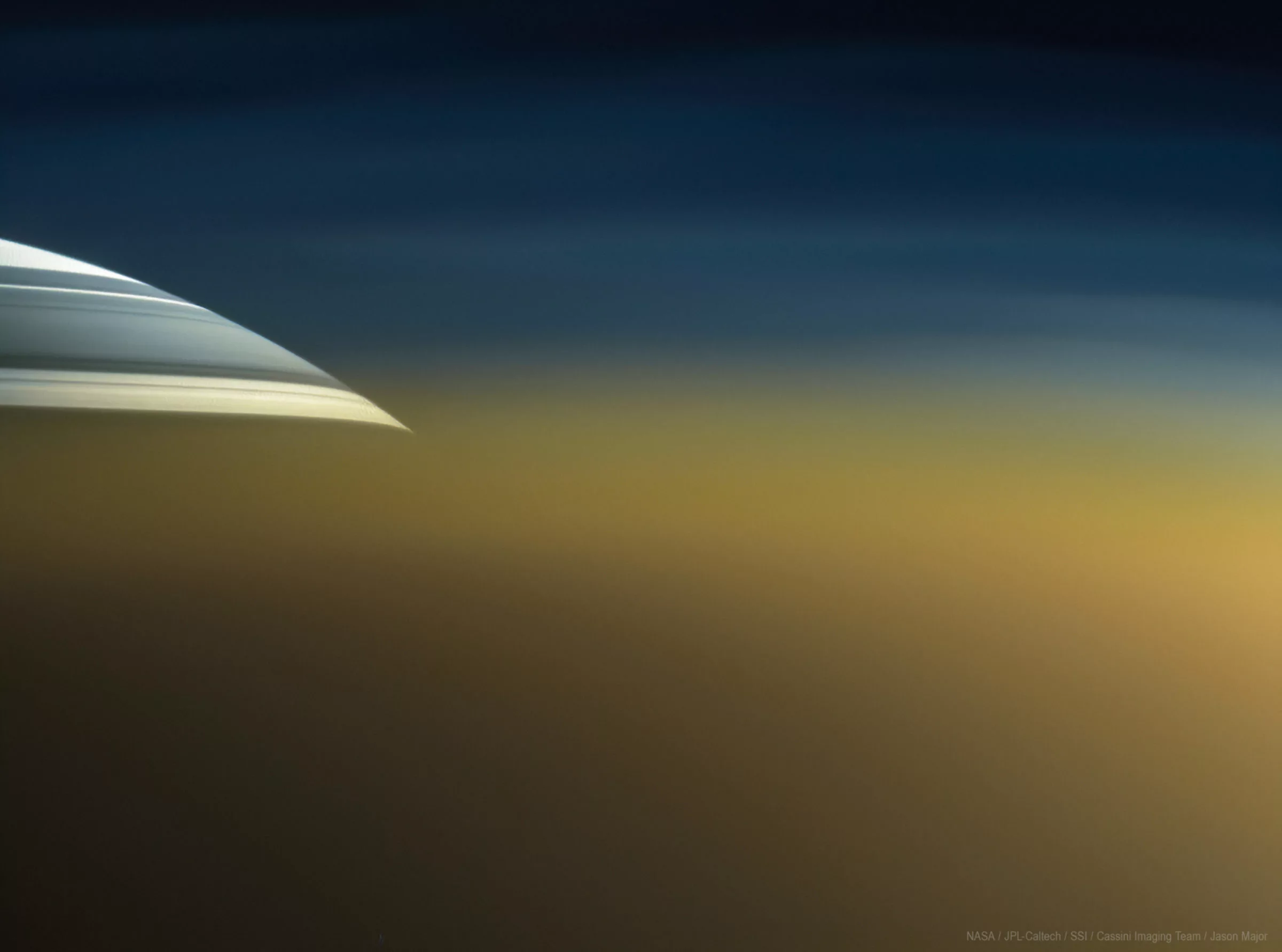 https://planetary.s3.amazonaws.com/web/assets/pictures/_2400x1783_crop_center-center_82_line/20200401_saturn-through-titan-atmosphere.jpg.webp