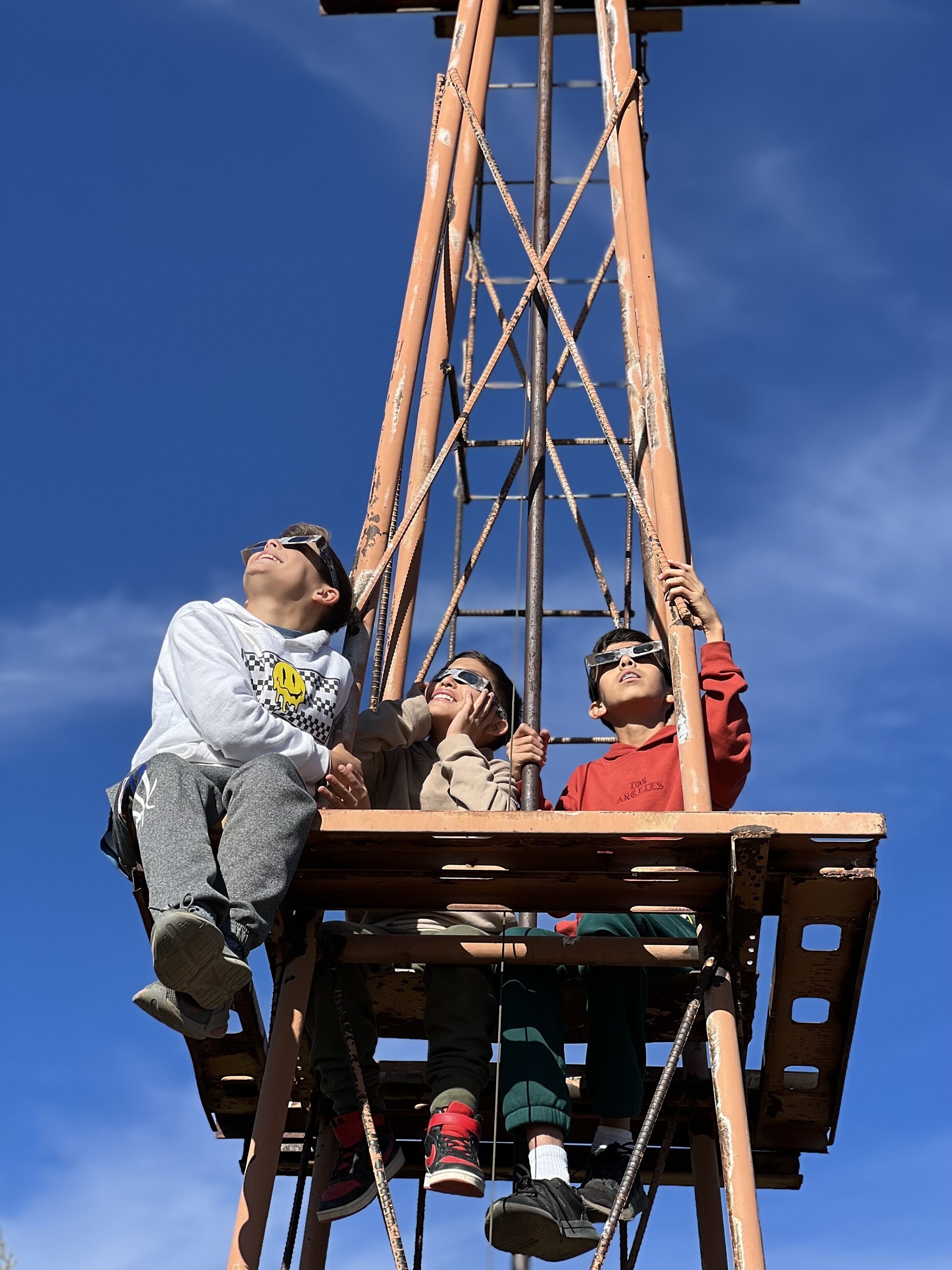 Children observing the 2023 annular solar… | The Planetary Society