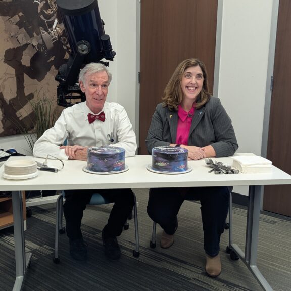 Bill and jenn with cakes
