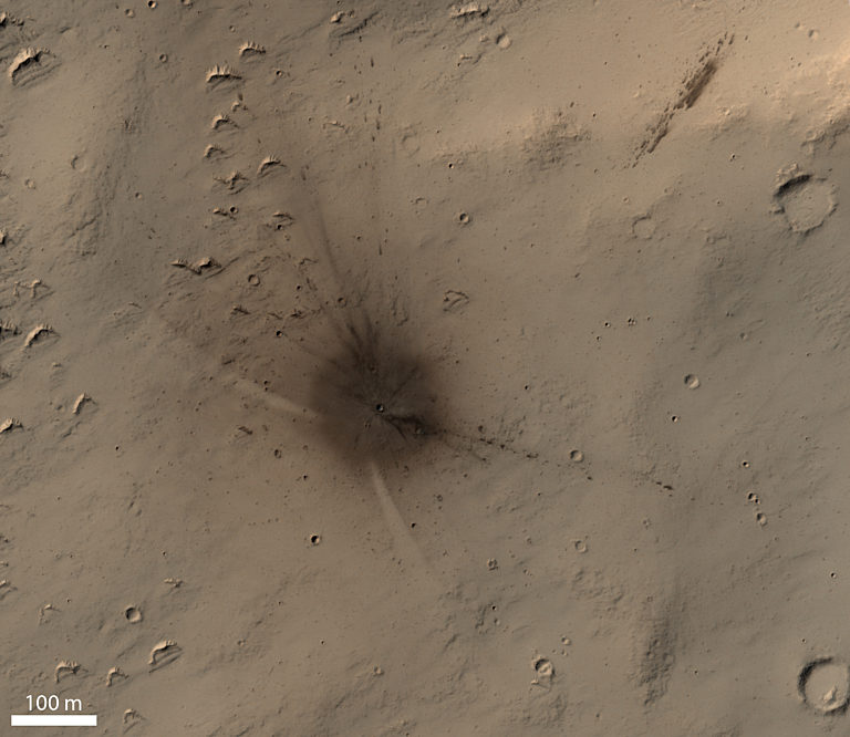 Fresh, dark-rayed oblique impact crater on… | The Planetary Society